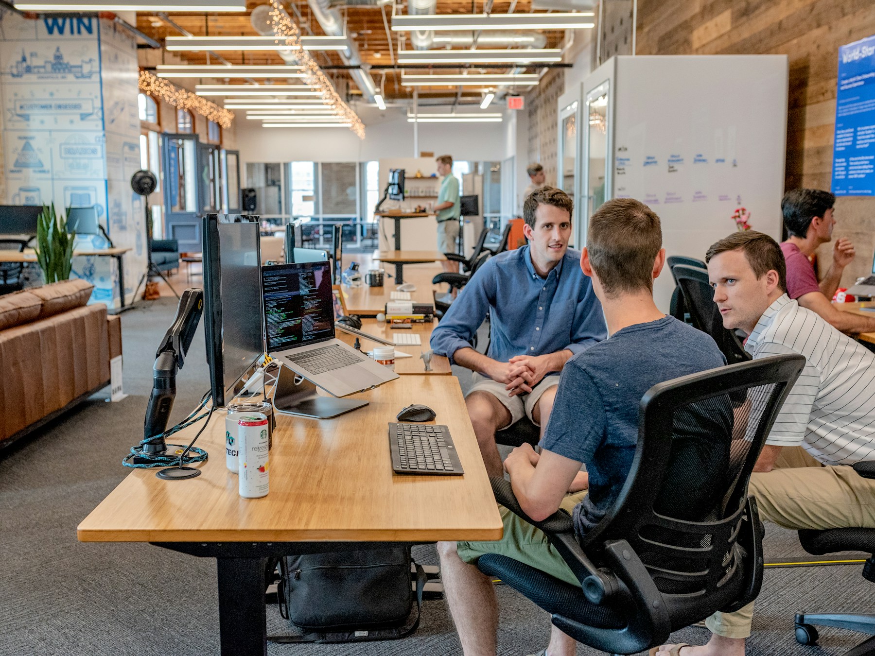 Professionals discussing a staffing project